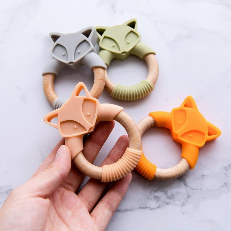 Silicone and wood on sale teether